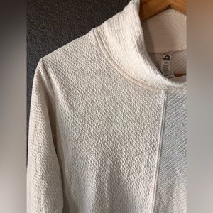 Cream cowl neck woman’s sweater